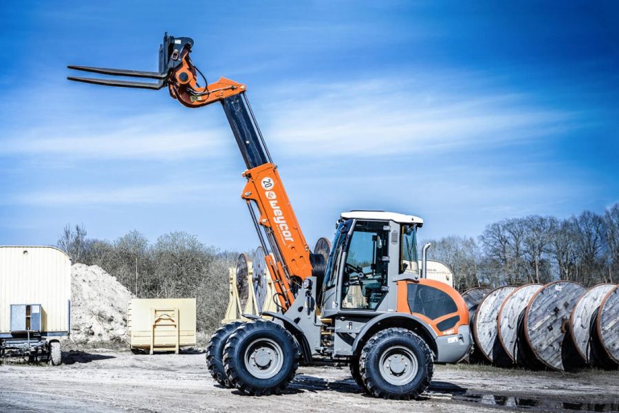 Weycor telescopic wheel loader with high lift arm and pallet fork.