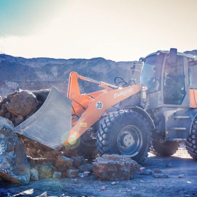 Weycor wheel loader moving rubble and rock.