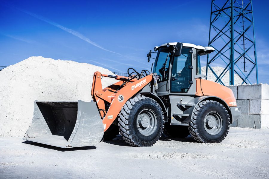 Weycor Radlader AR 580 auf Baustelle mit hellem Schüttgut.